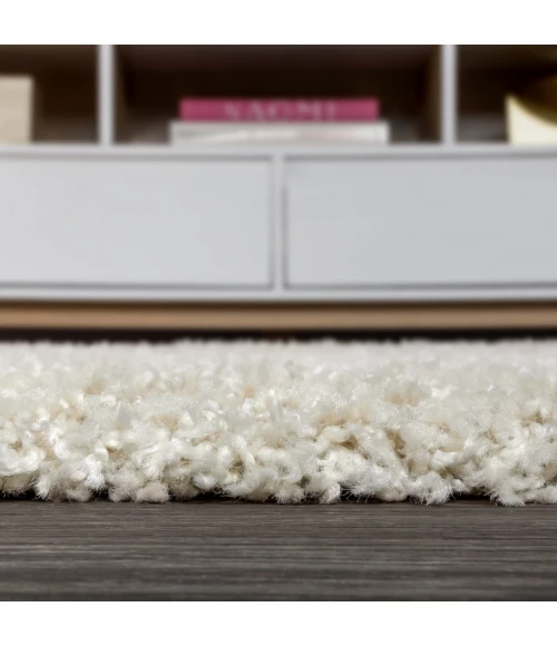 Mercer Shag Plush Tassel Cream 2 ft. x 8 ft. Runner Rug