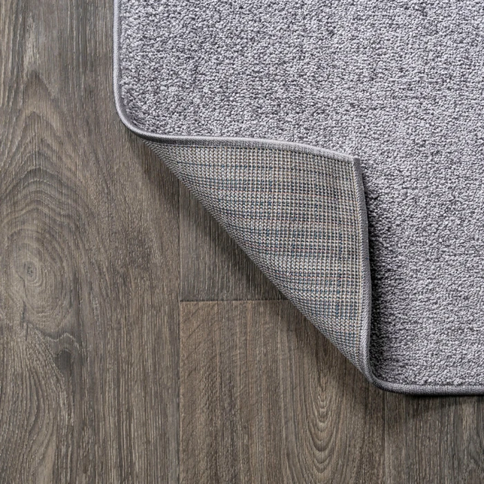 Haze Solid Low-Pile Gray 6 ft. x 9 ft. Oval Area Rug