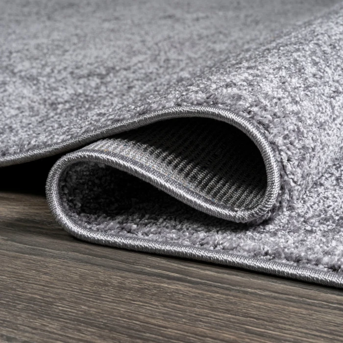 Haze Solid Low-Pile Gray 3 ft. x 5 ft. Oval Area Rug