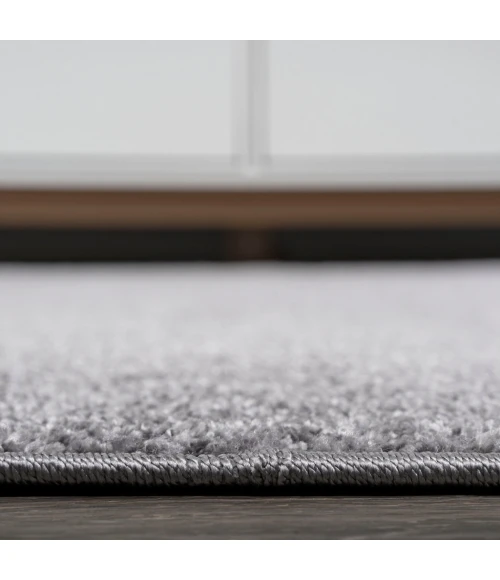 Haze Solid Low-Pile Gray 5 ft. x 8 ft. Oval Area Rug