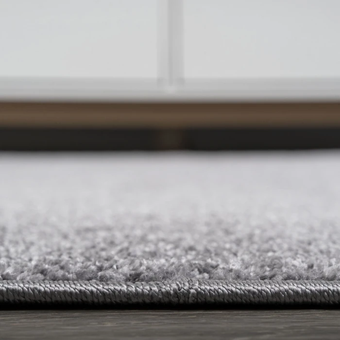 Haze Solid Low-Pile Gray 6 ft. x 9 ft. Oval Area Rug