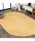 Haze Solid Low-Pile Mustard 5 ft. x 8 ft. Oval Area Rug