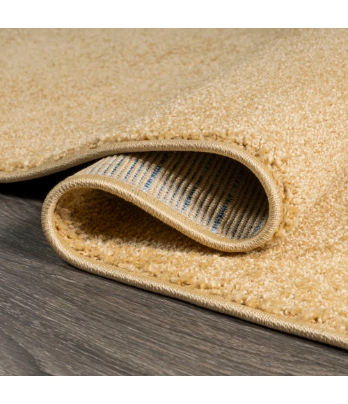 Haze Solid Low-Pile Mustard 3 ft. x 5 ft. Oval Area Rug