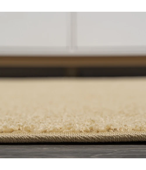 Haze Solid Low-Pile Mustard 6' Round Area Rug