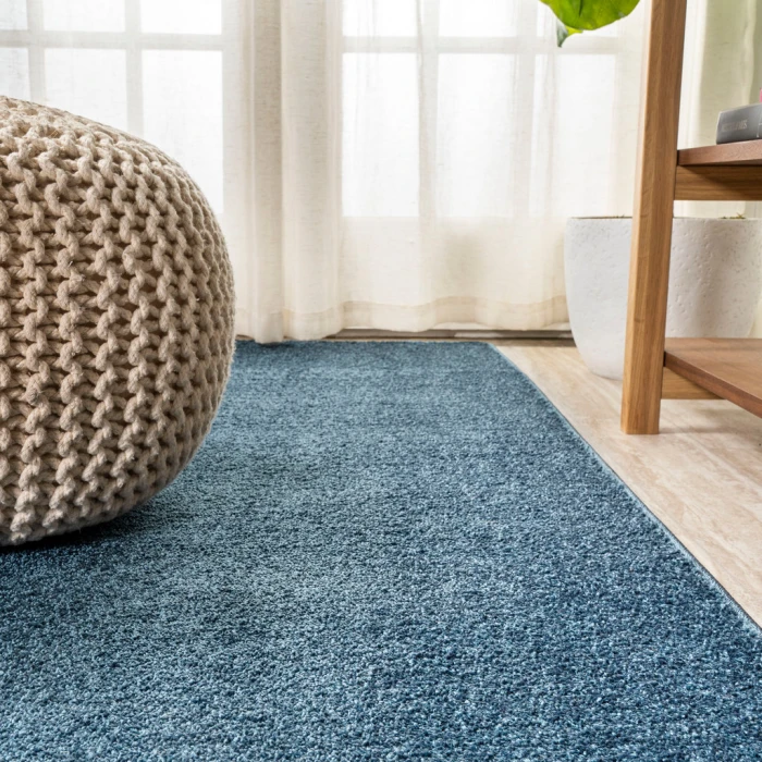 Haze Solid Low-Pile Navy 5 ft. x 8 ft. Oval Area Rug