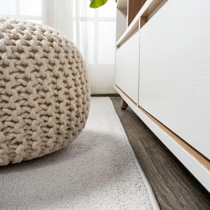 Haze Solid Low-Pile Ivory 5 ft. x 8 ft. Oval Area Rug