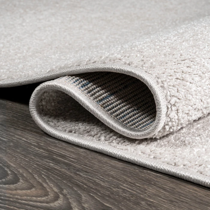 Haze Solid Low-Pile Ivory 5' Square Area Rug