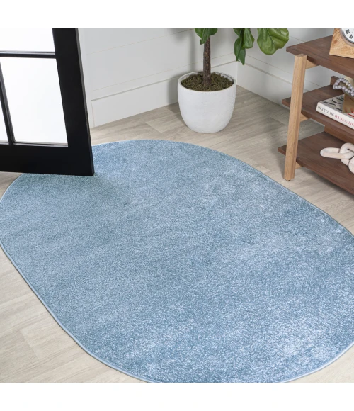 Haze Solid Low-Pile Classic Blue 5 ft. x 8 ft. Oval Area Rug