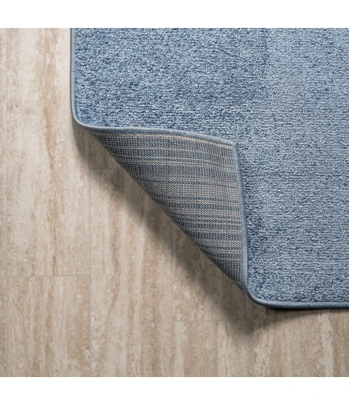 Haze Solid Low-Pile Classic Blue 5 ft. x 8 ft. Oval Area Rug