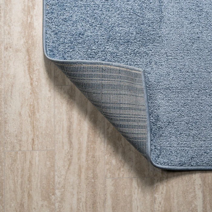 Haze Solid Low-Pile Classic Blue 6 ft. x 9 ft. Oval Area Rug