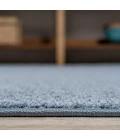 Haze Solid Low-Pile Classic Blue 5 ft. x 8 ft. Oval Area Rug
