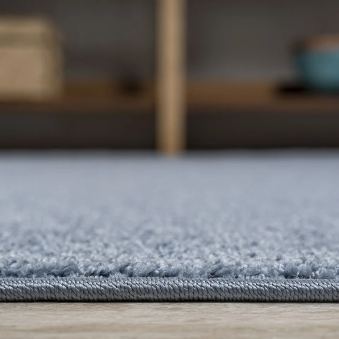 Haze Solid Low-Pile Classic Blue 6 ft. x 9 ft. Oval Area Rug
