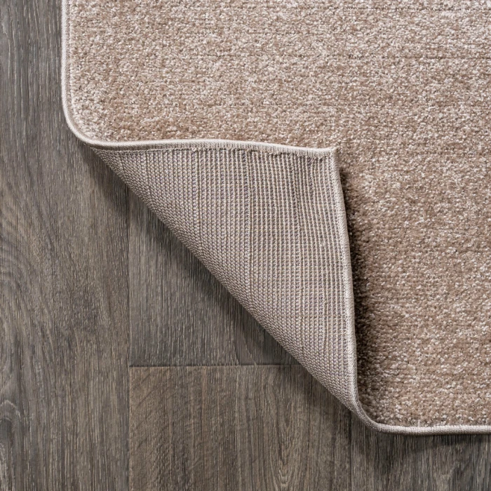 Haze Solid Low-Pile Beige 5 ft. x 8 ft. Oval Area Rug