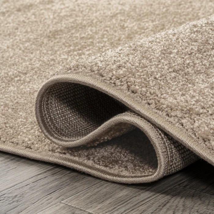 Haze Solid Low-Pile Beige 5 ft. x 8 ft. Oval Area Rug