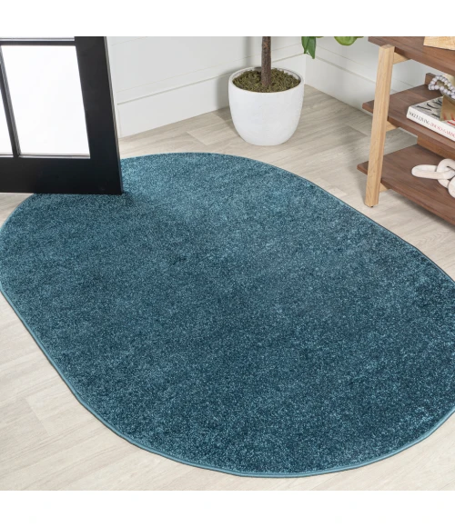 Haze Solid Low-Pile Turquoise 5 ft. x 8 ft. Oval Area Rug
