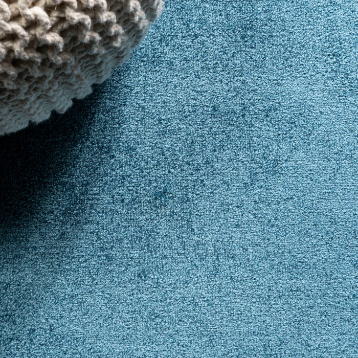 Haze Solid Low-Pile Turquoise 6 ft. x 9 ft. Oval Area Rug