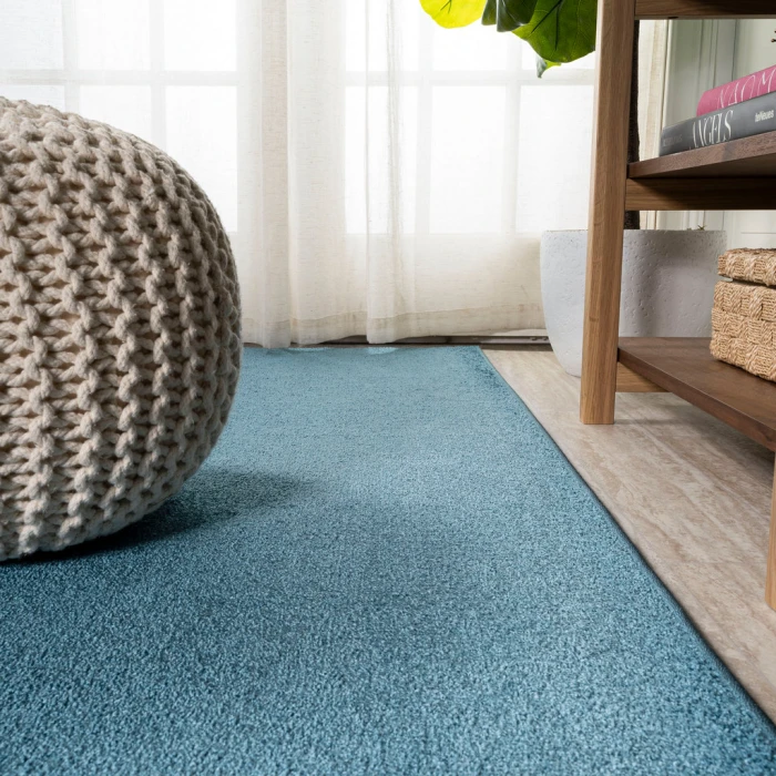 Haze Solid Low-Pile Turquoise 6 ft. x 9 ft. Oval Area Rug