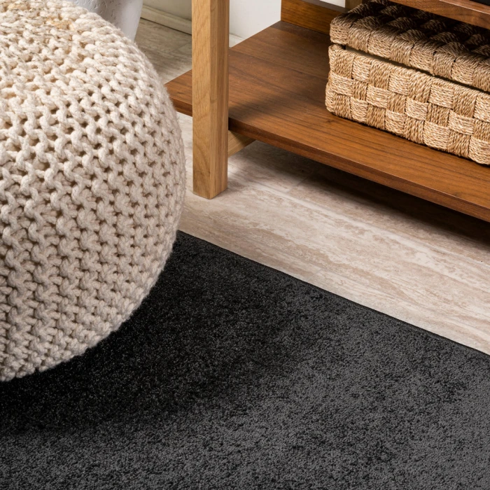 Haze Solid Low-Pile Black 6 ft. x 9 ft. Oval Area Rug