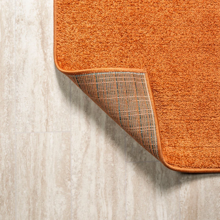 Haze Solid Low-Pile Orange 10 ft. x 14 ft. Area Rug