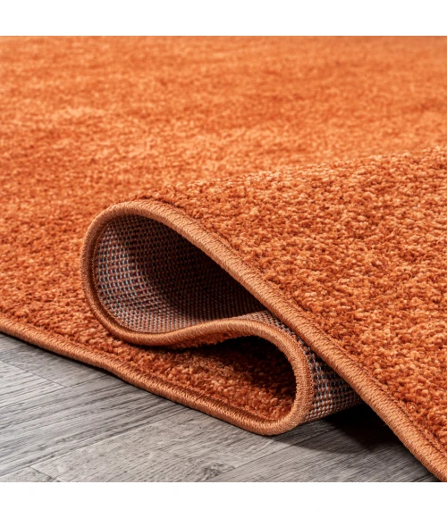 Haze Solid Low-Pile Orange 6 ft. x 9 ft. Area Rug