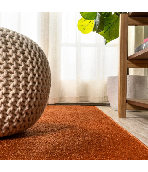 Haze Solid Low-Pile Orange 6 ft. x 9 ft. Area Rug