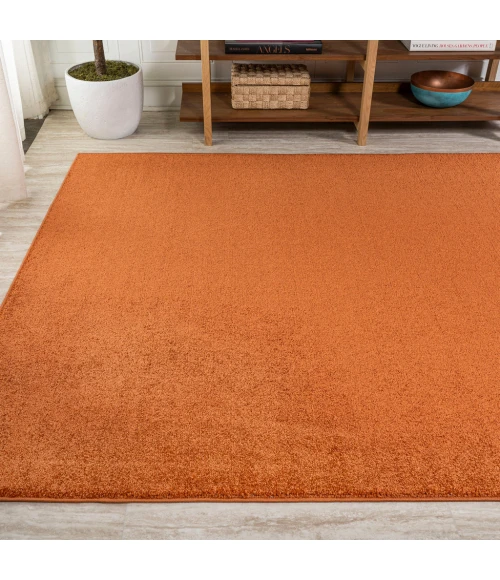 Haze Solid Low-Pile Orange 5 ft. x 8 ft. Area Rug