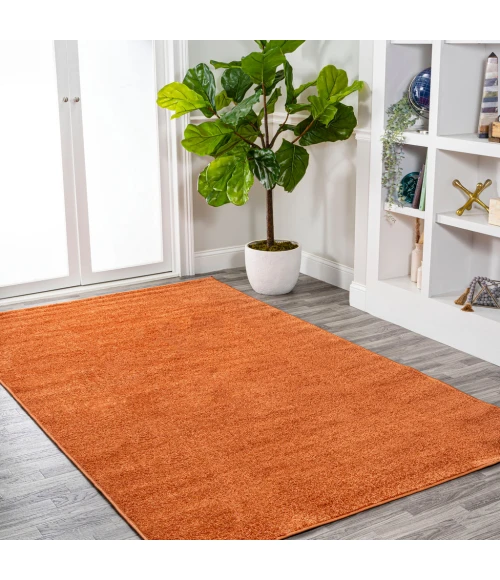 Haze Solid Low-Pile Orange 5 ft. x 8 ft. Area Rug