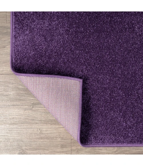 Haze Solid Low-Pile Purple 4 ft. x 6 ft. Oval Area Rug