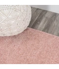 Haze Solid Low-Pile Pink 5 ft. x 8 ft. Oval Area Rug