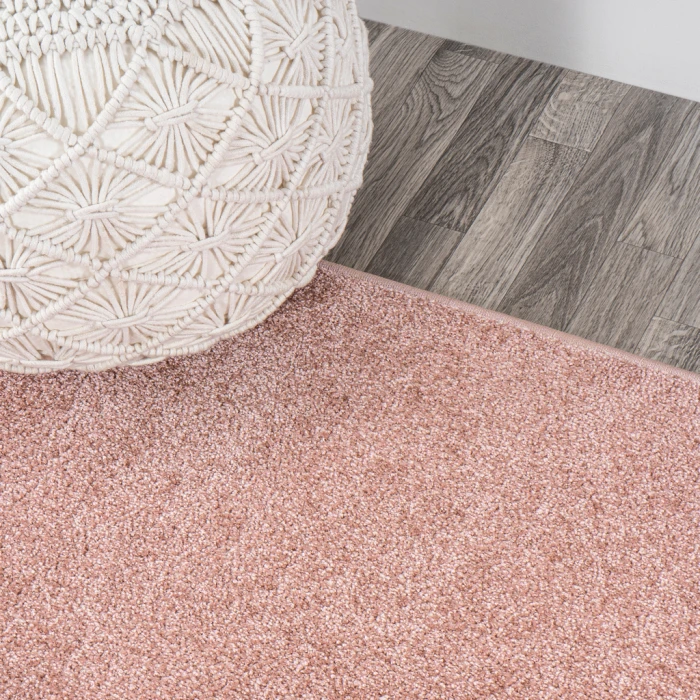 Haze Solid Low-Pile Pink 6 ft. x 9 ft. Oval Area Rug