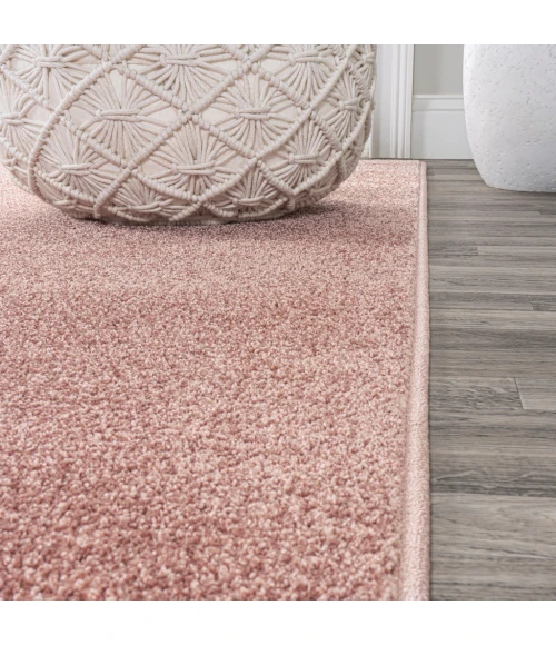 Haze Solid Low-Pile Pink 5 ft. x 8 ft. Oval Area Rug
