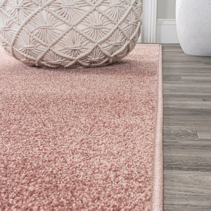 Haze Solid Low-Pile Pink 6 ft. x 9 ft. Oval Area Rug