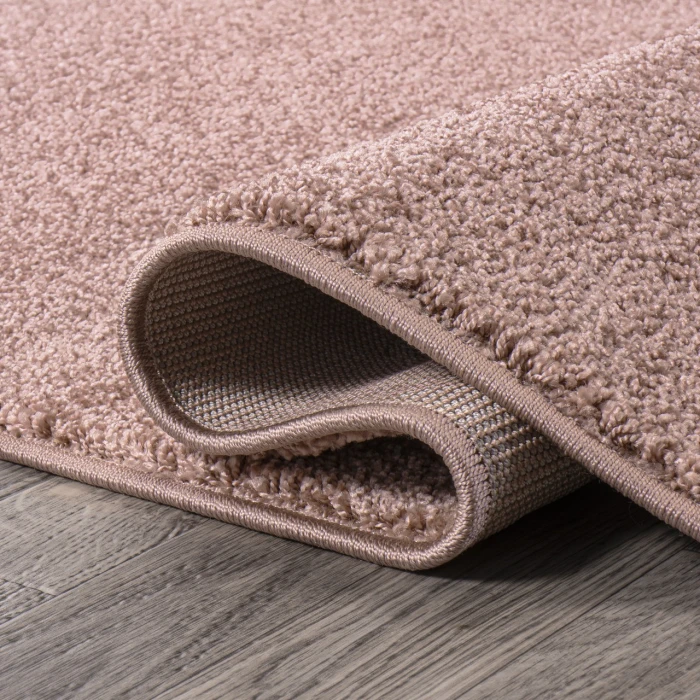 Haze Solid Low-Pile Pink 6 ft. x 9 ft. Oval Area Rug