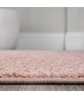 Haze Solid Low-Pile Pink 5 ft. x 8 ft. Oval Area Rug
