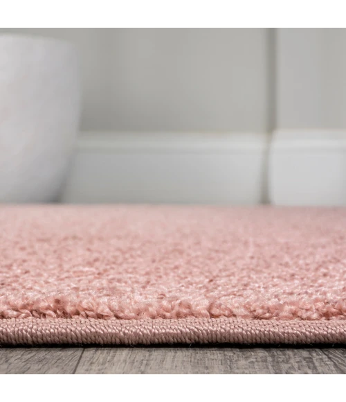 Haze Solid Low-Pile Pink 5 ft. x 8 ft. Oval Area Rug