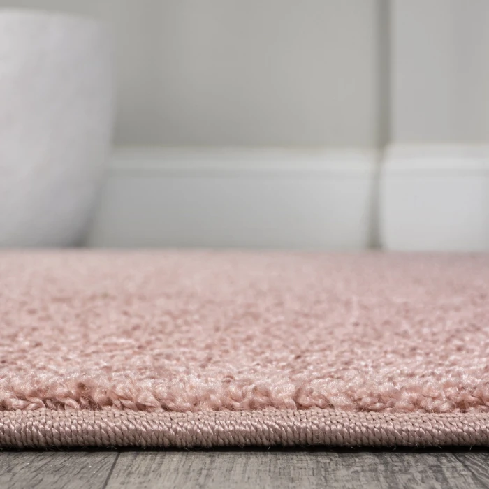 Haze Solid Low-Pile Pink 6 ft. x 9 ft. Oval Area Rug