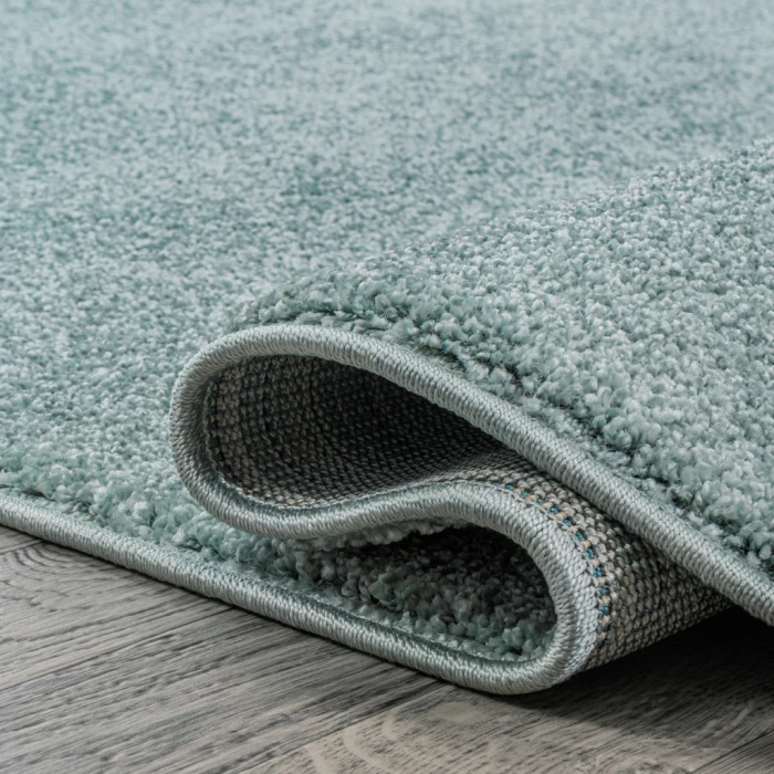 Haze Solid Low-Pile Light Blue 10 ft. x 14 ft. Area Rug