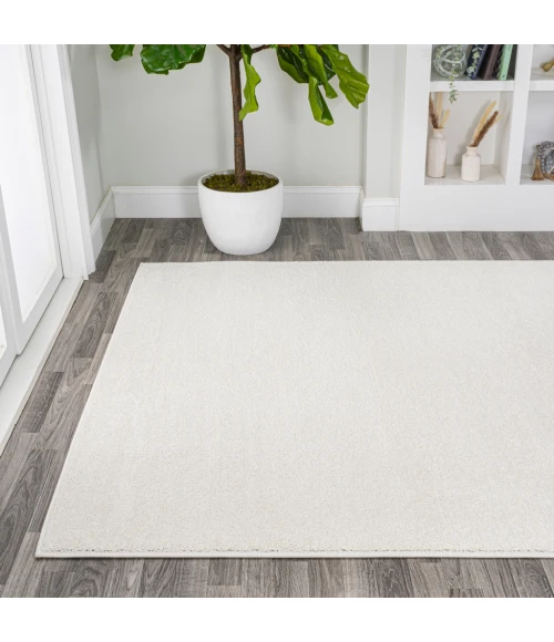Haze Solid Low-Pile Cream 10 ft. x 14 ft. Area Rug
