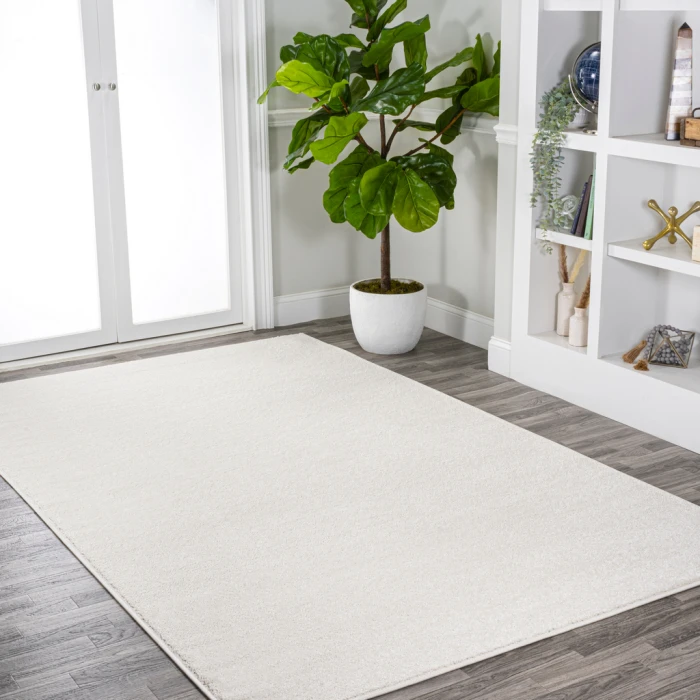 Haze Solid Low-Pile Cream 10 ft. x 14 ft. Area Rug