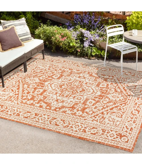 Sinjuri Medallion Textured Weave Orange/Cream 4 ft. x 6 ft. Indoor/Outdoor Area Rug