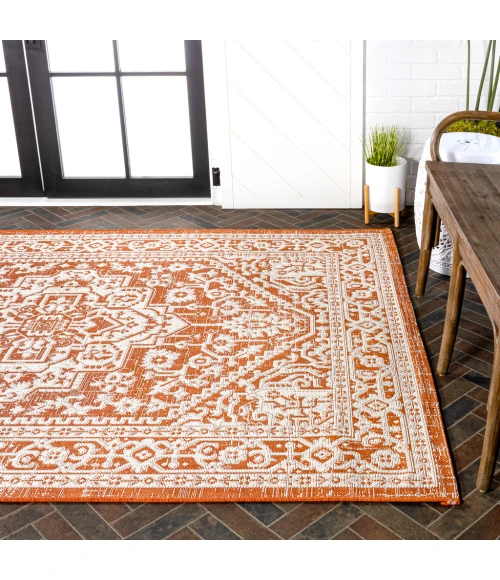 Sinjuri Medallion Textured Weave Orange/Cream 4 ft. x 6 ft. Indoor/Outdoor Area Rug