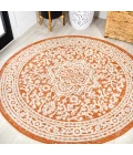 Sinjuri Medallion Textured Weave Orange/Cream 5' Round Indoor/Outdoor Area Rug