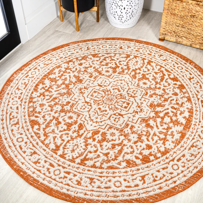Sinjuri Medallion Textured Weave Orange/Cream 5' Round Indoor/Outdoor Area Rug