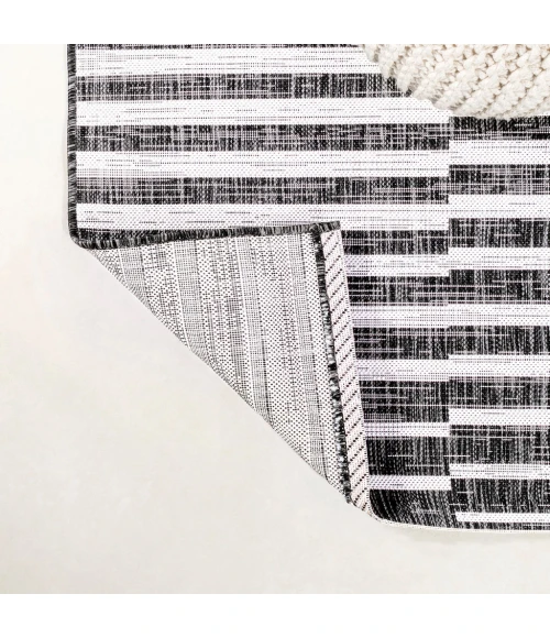 Sukie Modern Offset Stripe Black/Ivory 2 ft. x 10 ft. Indoor/Outdoor Runner Rug