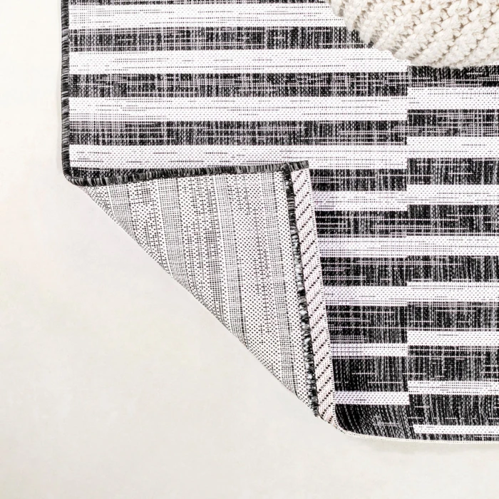 Sukie Modern Offset Stripe Black/Ivory 2 ft. x 10 ft. Indoor/Outdoor Runner Rug
