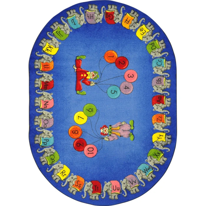 Joy Carpets Kid Essentials Multi Circus Elephant Parade 10ft.9in. x 13ft.2in. Oval Rug