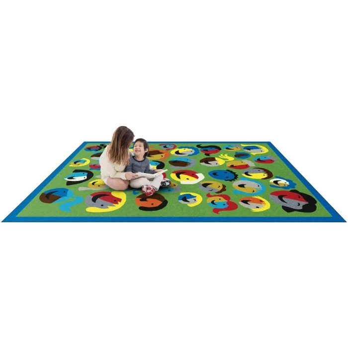 Joy Carpets Kid Essentials Green Joyful Faces 7ft.7in. Round Rug