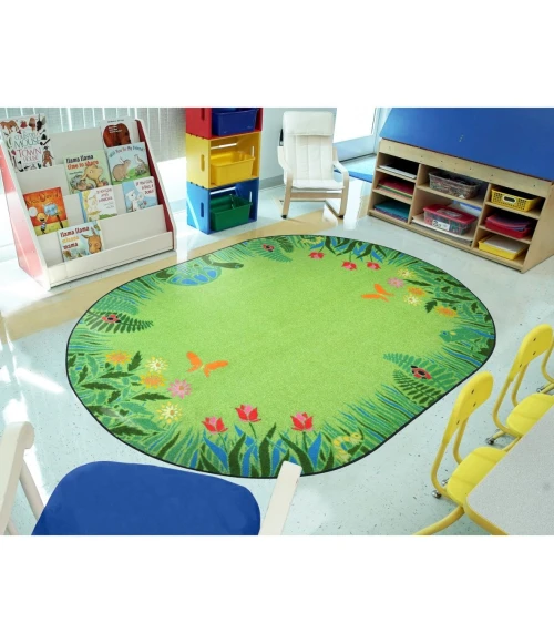 Joy Carpets Kid Essentials Green Merry Meadows 7ft.8in. x 10ft.9in. Oval Rug
