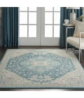 Nourison Tranquil Ivory Turquoise TRA07 5ft.3in. x 7ft.3in. Rect. Rug