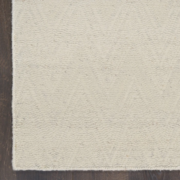 DKNY Pure Purl Cream / Ivory PUU01 5ft.3in. x 7ft.3in. Rect. Rug